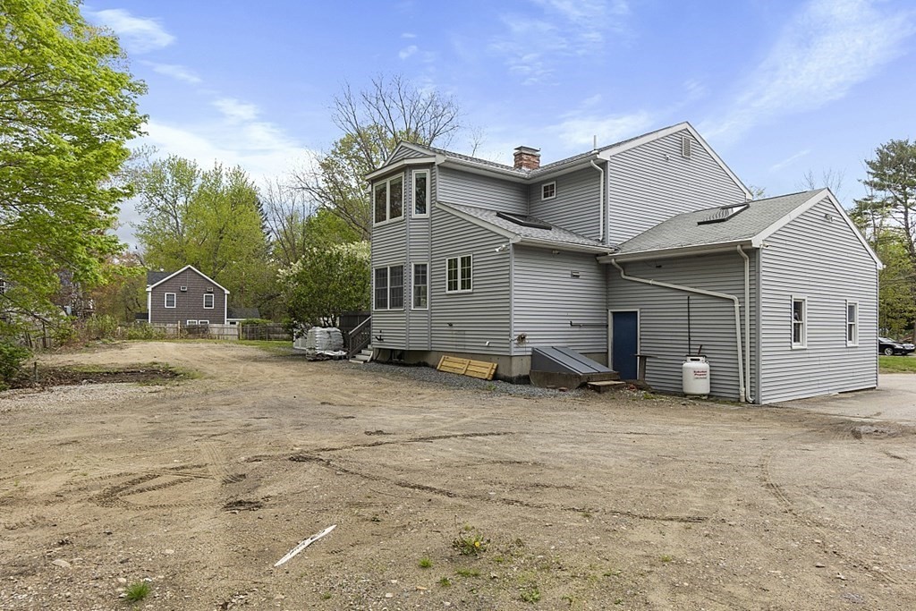 176 Southville Road Southborough, MA 01772 - Photo 37 of 39 a house with trees in the background