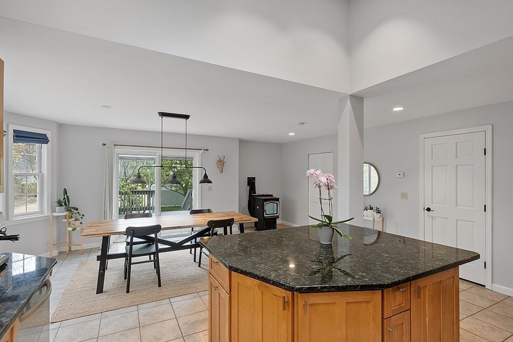 176 Southville Road Southborough, MA 01772 - Photo 9 of 39 a view of a center island and dining table