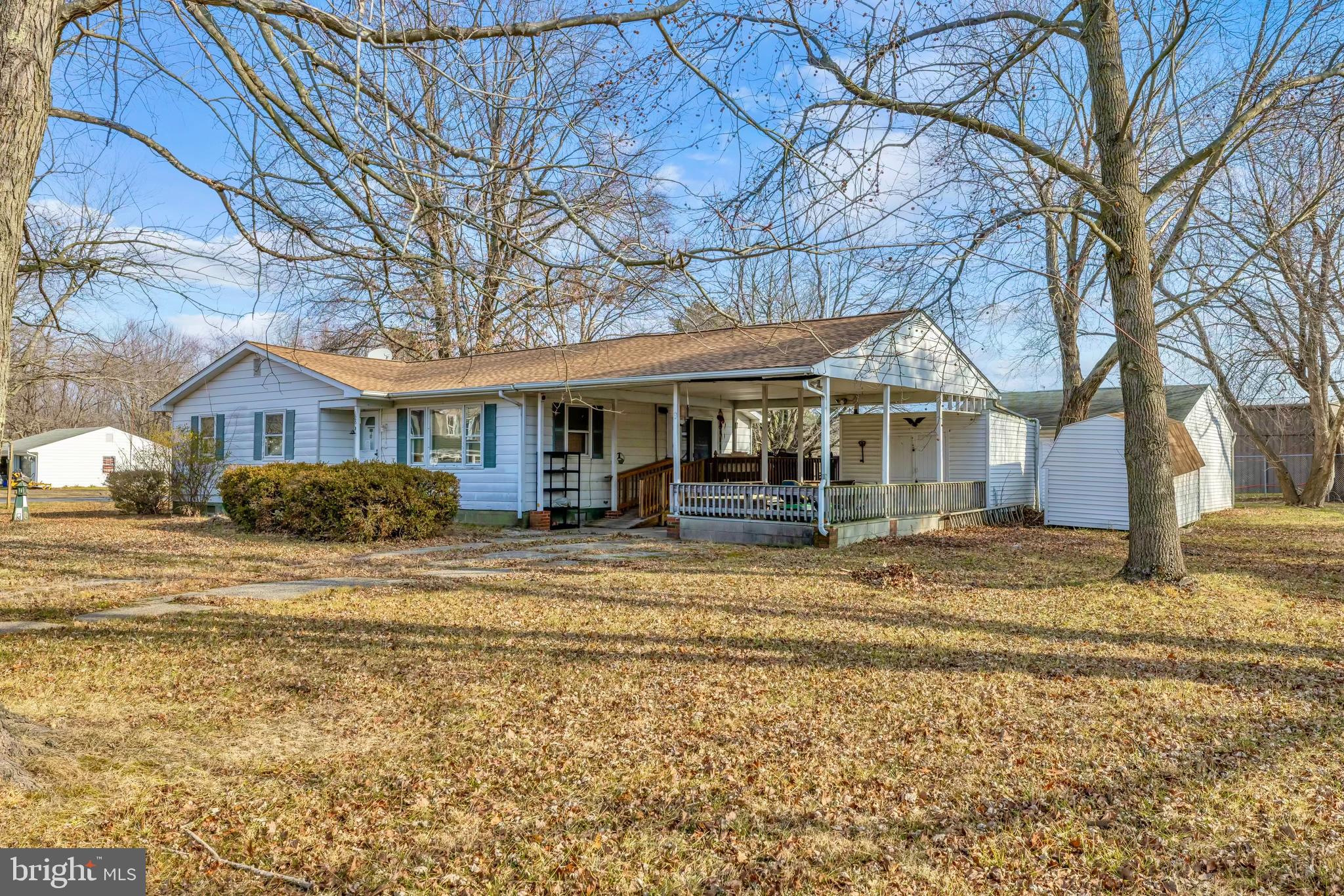 126 State Street Stevensville, MD 21666 - Photo 4 of 20 a front view of a house with a yard