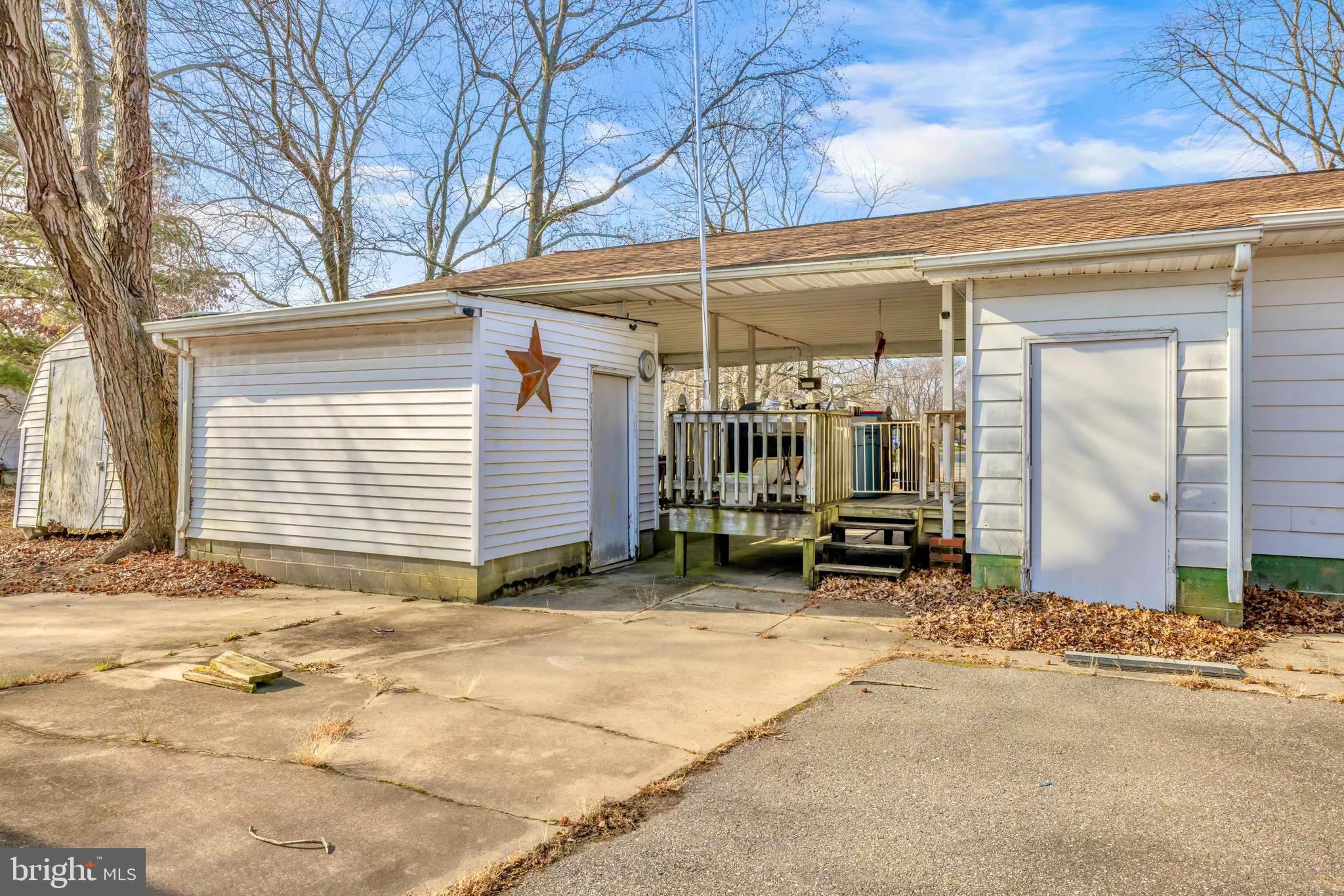 126 State Street Stevensville, MD 21666 - Photo 7 of 20 a view of a house with backyard and sitting area