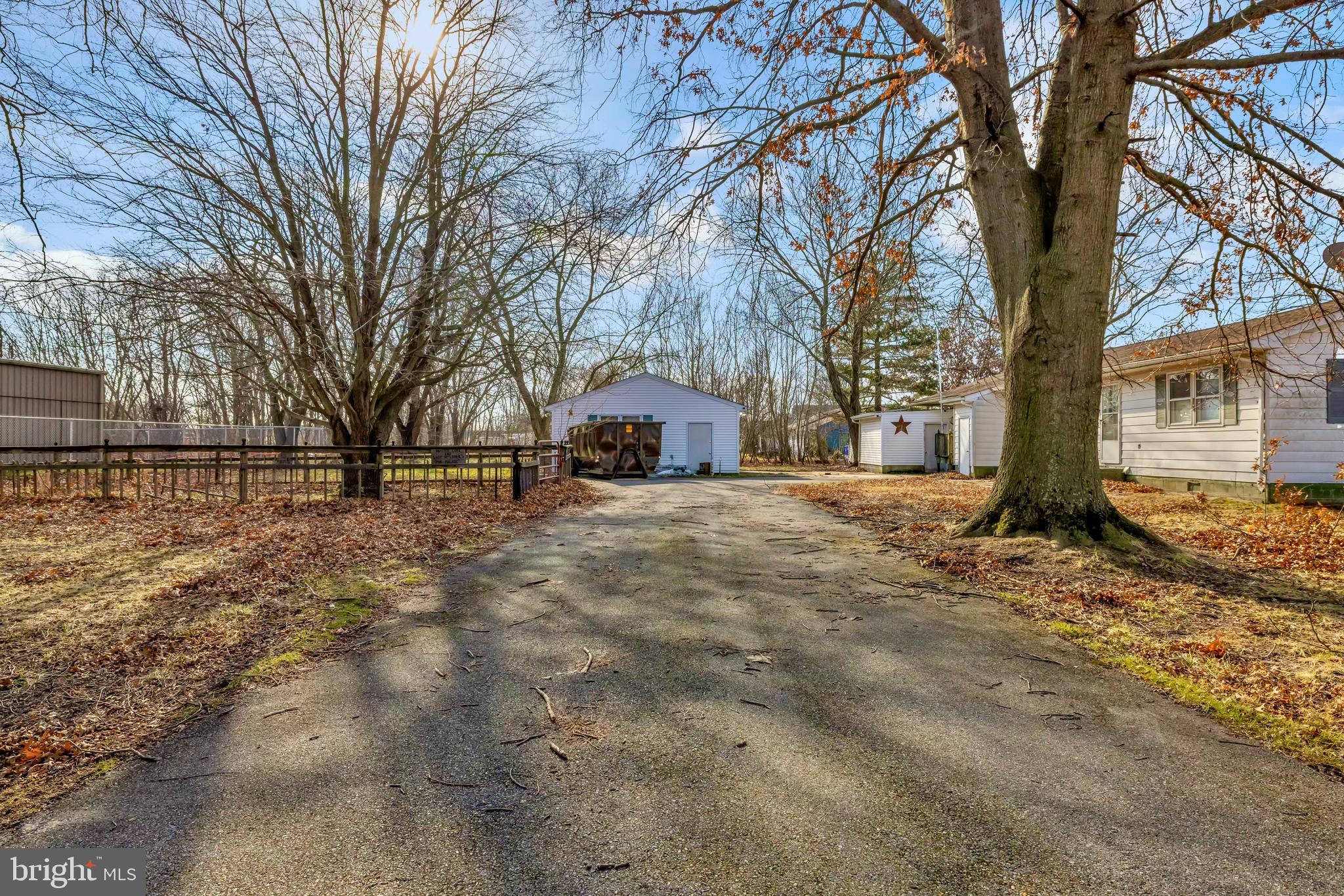 126 State Street Stevensville, MD 21666 - Photo 8 of 20 a view of road with trees