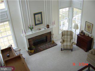 5 Hansel Road Newtown, PA 18940 - Photo 4 of 6 a living room with furniture and a fireplace