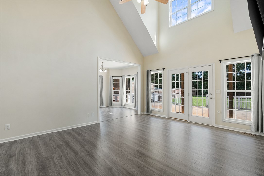 225 Streams Way Anderson, SC 29625 - Photo 15 of 50 This airy living space features soaring ceilings and tons of natural light from many windows and French doors.