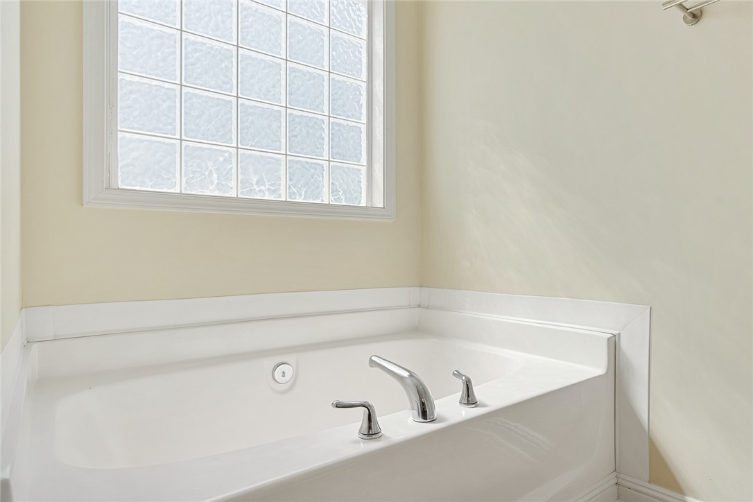225 Streams Way Anderson, SC 29625 - Photo 29 of 50 This primary bathroom offers a private garden tup and privacy window.