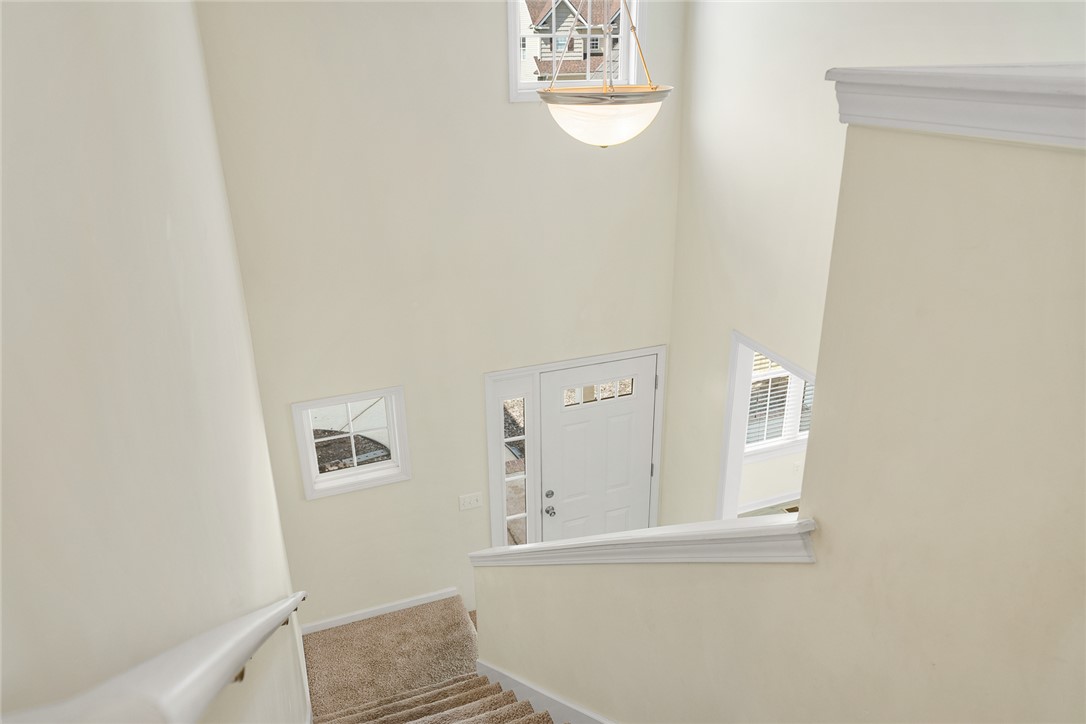 225 Streams Way Anderson, SC 29625 - Photo 31 of 50 Ascend from the front door to the second level, with high ceilings and lovely lighting fixtures.