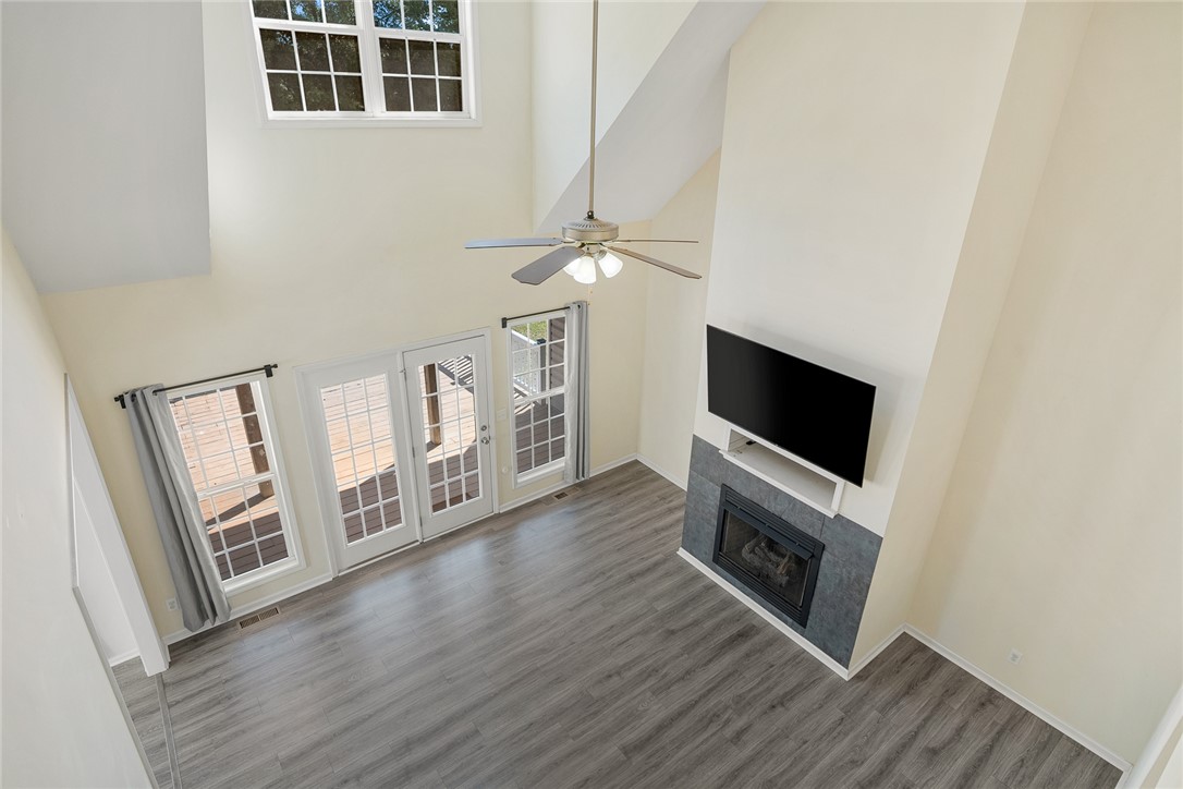 225 Streams Way Anderson, SC 29625 - Photo 32 of 50 From the loft, you can see the spacious living space with high ceilings and ceiling fan.