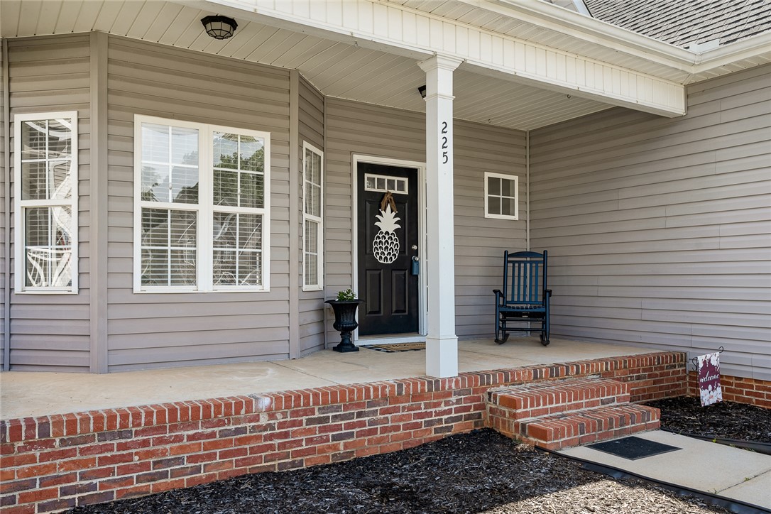 225 Streams Way Anderson, SC 29625 - Photo 4 of 50 Charming entry with brick detailing, inviting you into a lovely home.