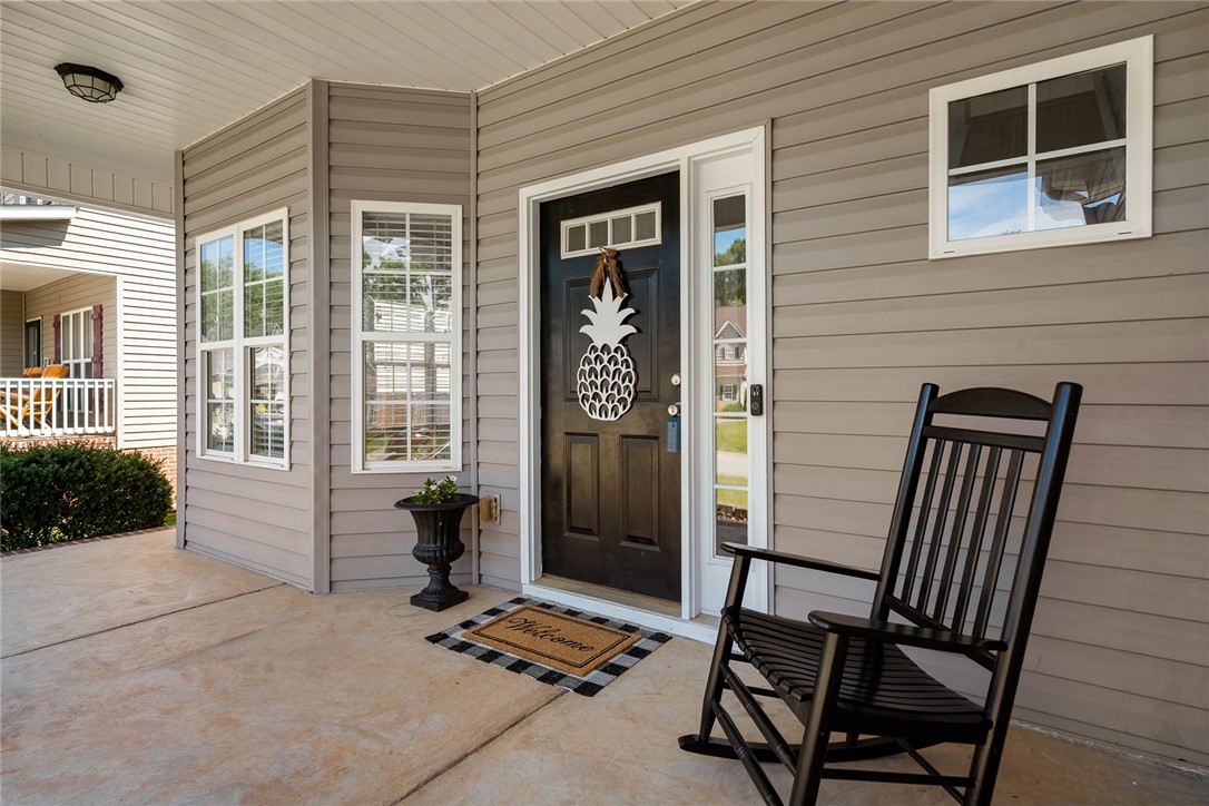 225 Streams Way Anderson, SC 29625 - Photo 5 of 50 The porch offers a cozy outdoor space, perfect for relaxing.