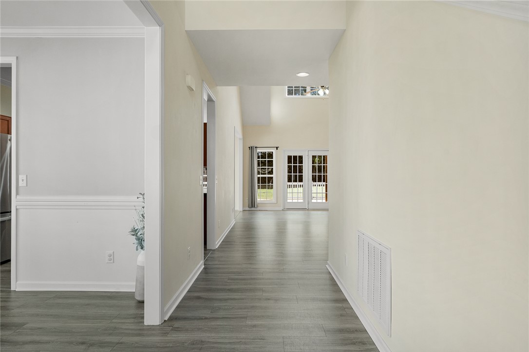 225 Streams Way Anderson, SC 29625 - Photo 9 of 50 This bright hallway offers clear passage and beautiful French doors leading to the exterior.
