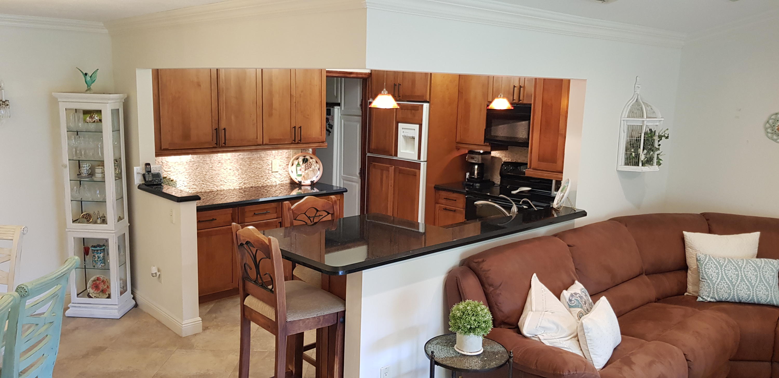 23451 Southwest 55th Avenue, Unit A Boca Raton, FL 33433 - Photo 18 of 60 Living - Kitchen View 2