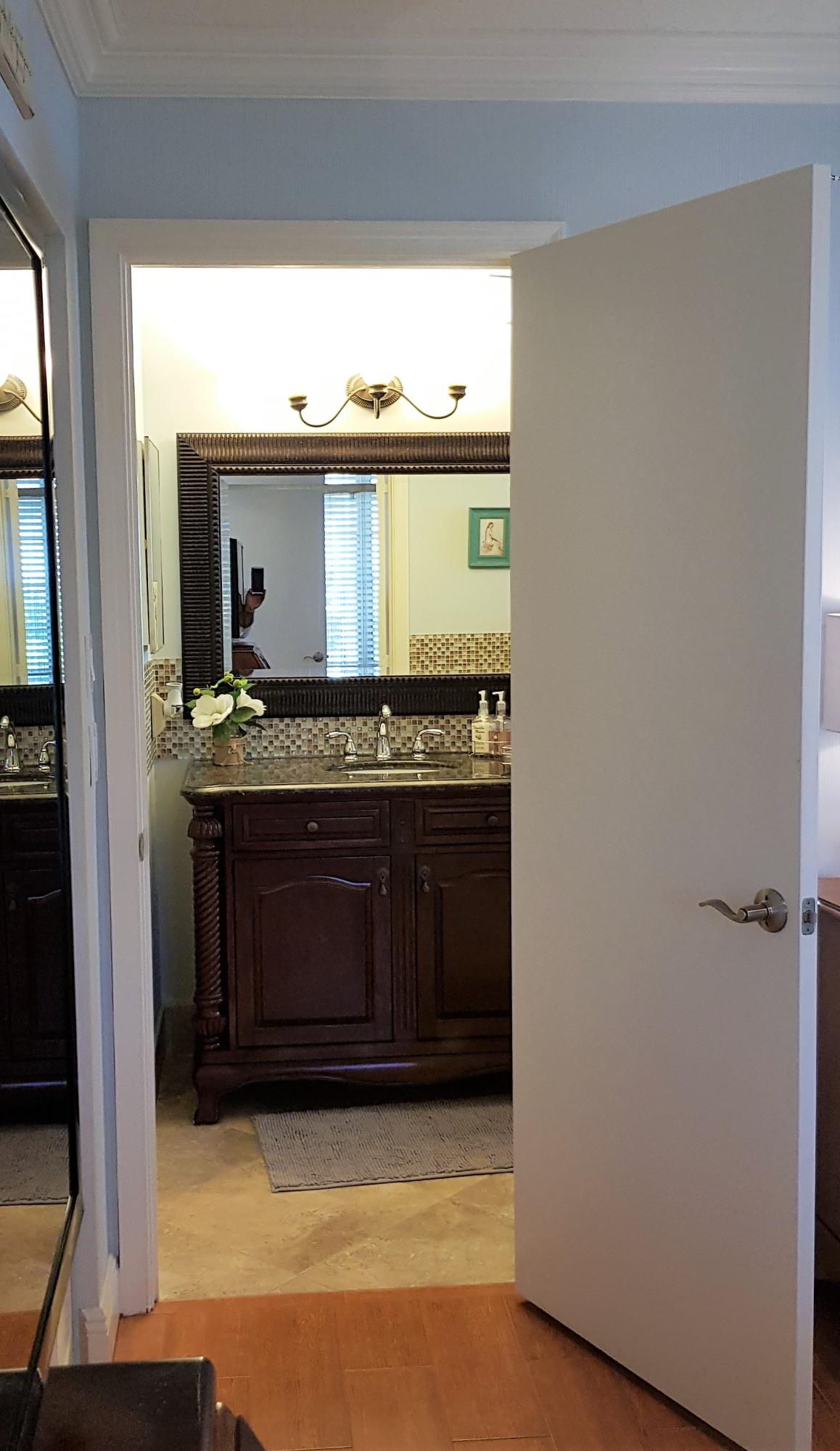 23451 Southwest 55th Avenue, Unit A Boca Raton, FL 33433 - Photo 40 of 60 Bedroom 2 Bath Entrance Open