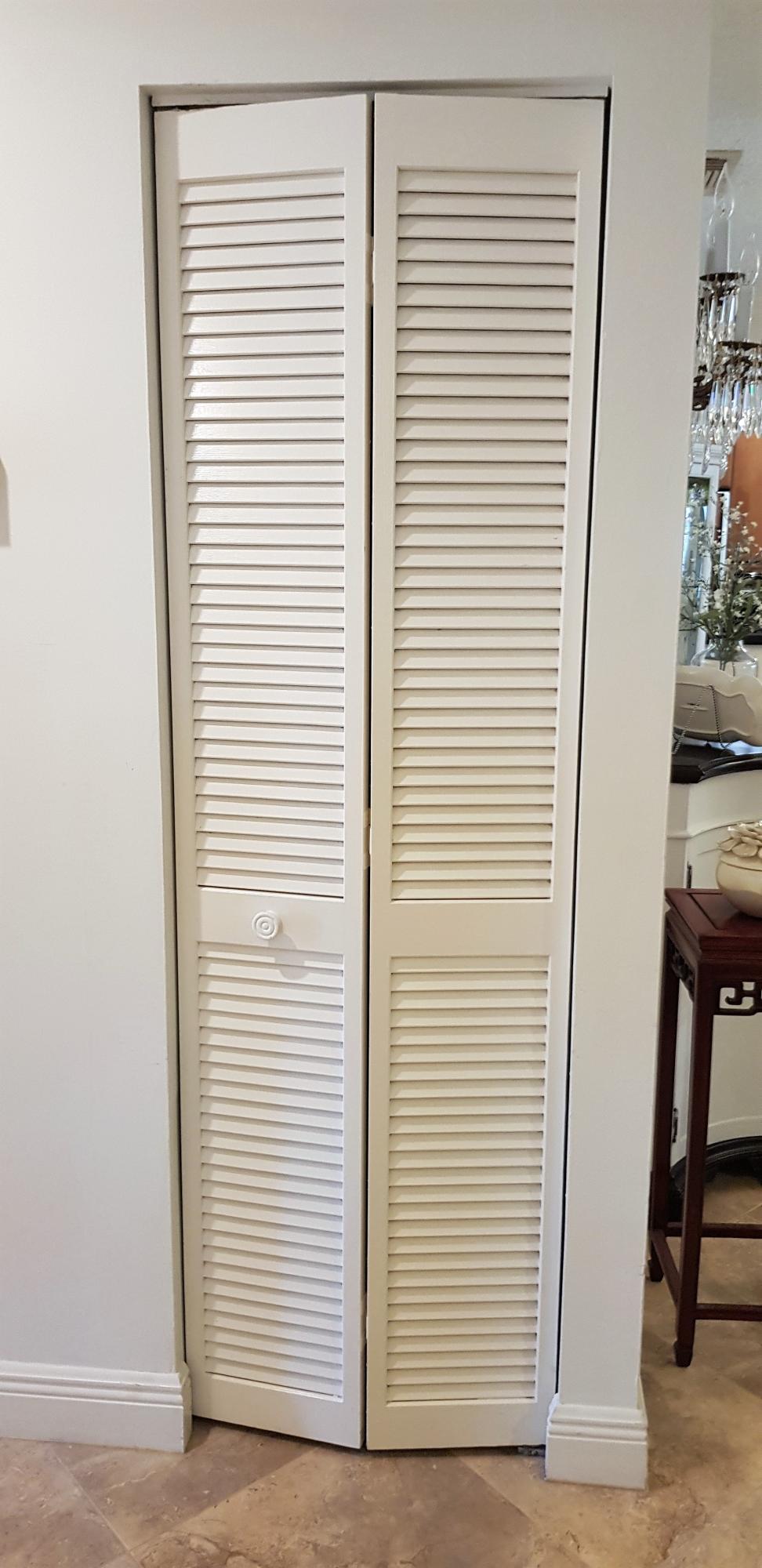 23451 Southwest 55th Avenue, Unit A Boca Raton, FL 33433 - Photo 43 of 60 AC Closet Closed