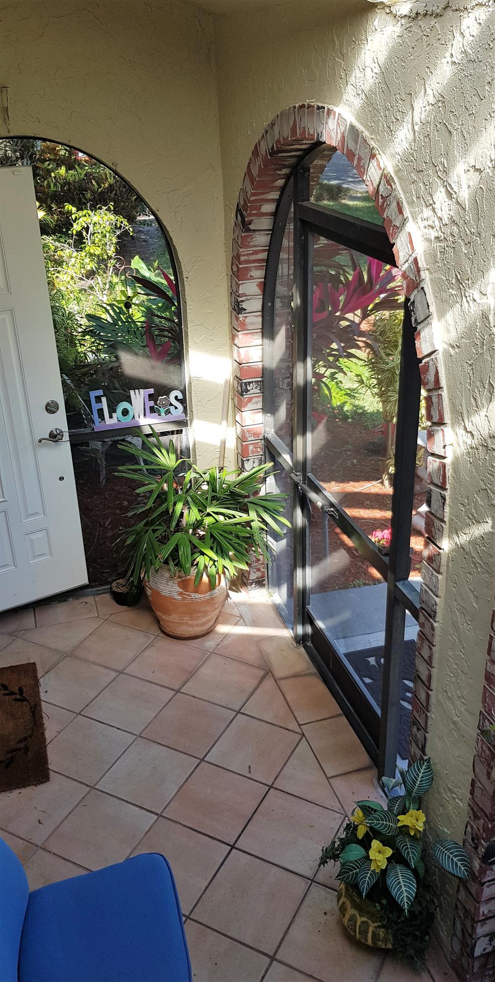 23451 Southwest 55th Avenue, Unit A Boca Raton, FL 33433 - Photo 5 of 60 Inside Front Patio