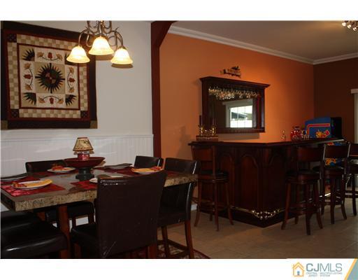 9 Lafayette Street Carteret, NJ 07008 - Photo 9 of 18 a view of a workspace with furniture