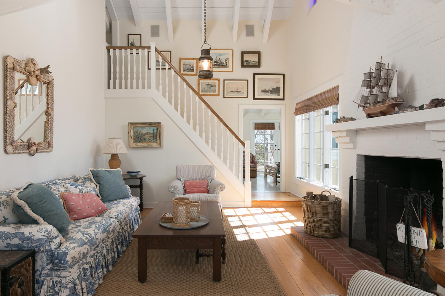 181 Rincon Point Road Carpinteria, CA 93013 - Photo 15 of 44 a living room with furniture and a fireplace