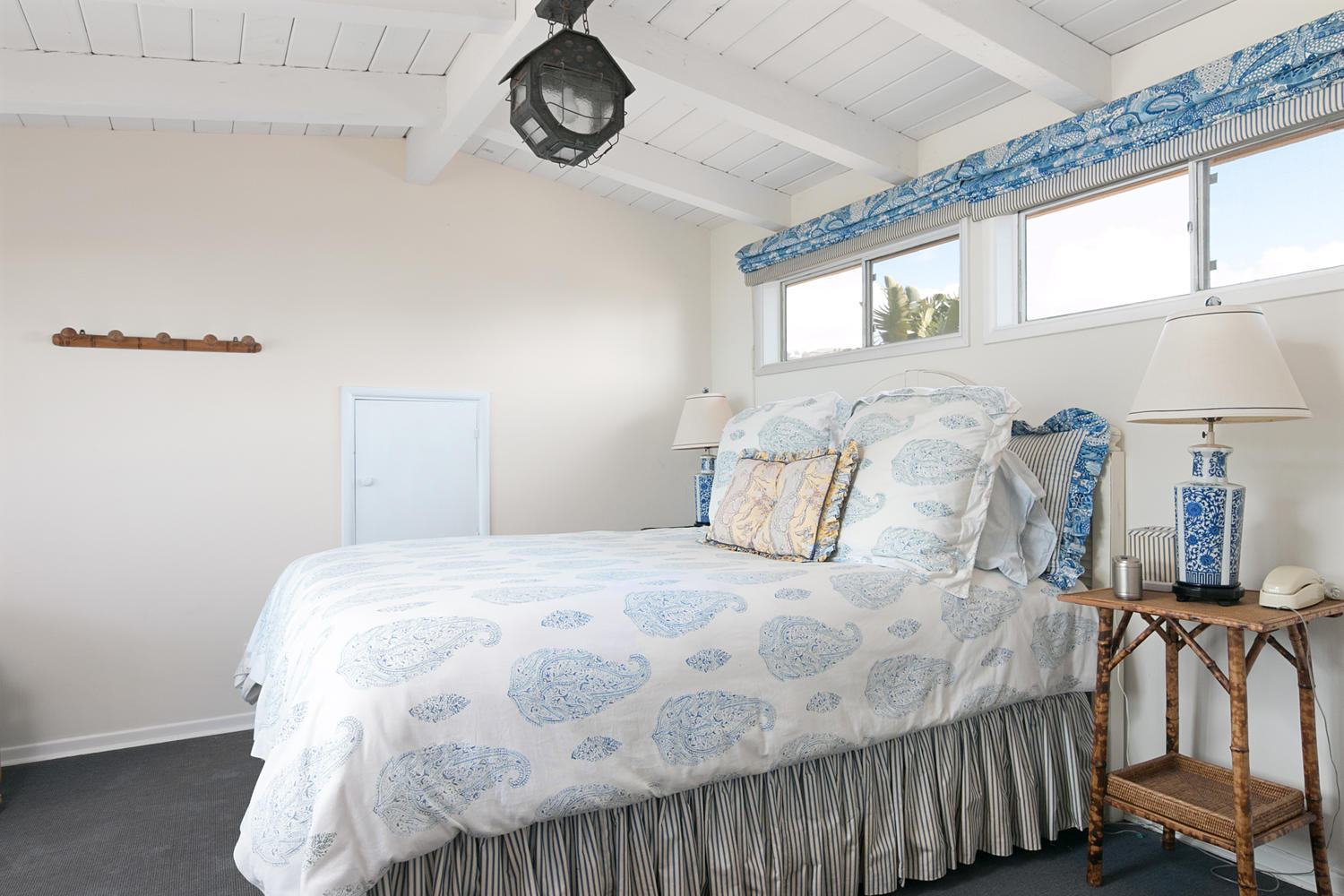 181 Rincon Point Road Carpinteria, CA 93013 - Photo 28 of 44 a bedroom with a bed and a large window