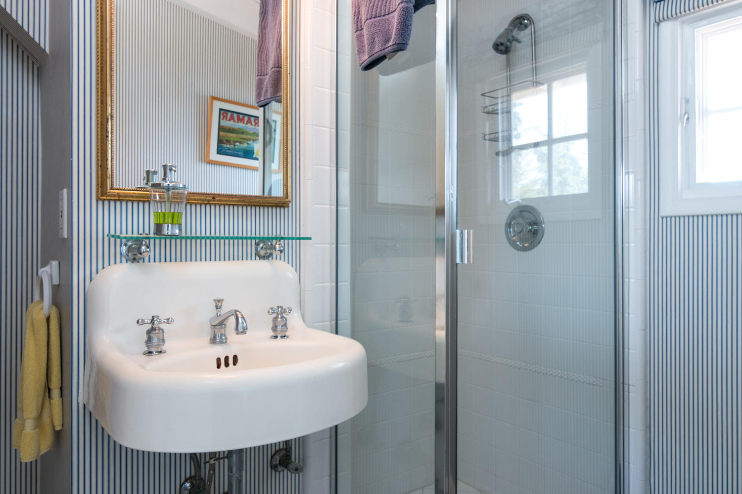 181 Rincon Point Road Carpinteria, CA 93013 - Photo 30 of 44 a bathroom with a sink and mirror
