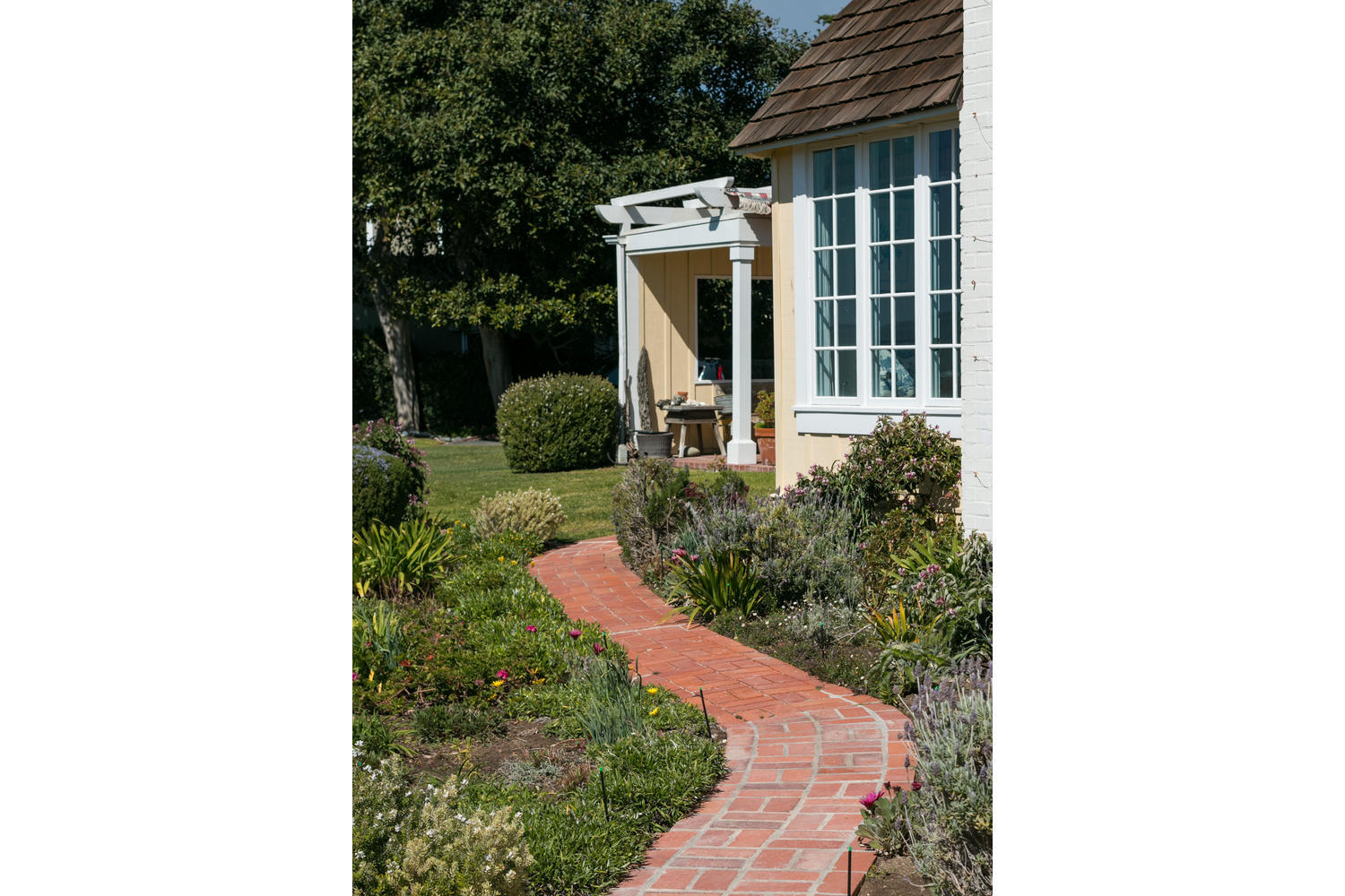 181 Rincon Point Road Carpinteria, CA 93013 - Photo 41 of 44 a view of a house with a yard and pathway