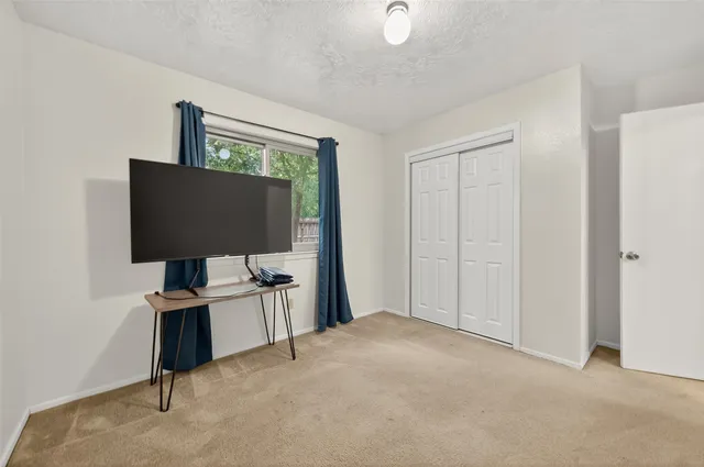 a workspace with furniture and mirror