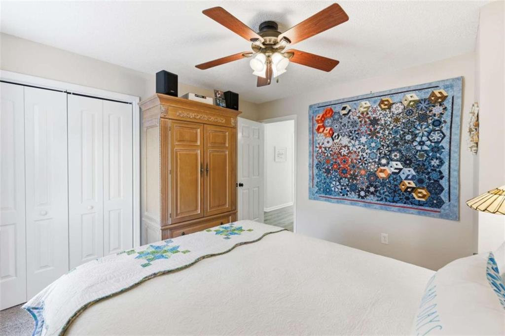 4033 Mt Vernon Road Gainesville, GA 30506 - Photo 18 of 47 a bedroom with a bed and a painting on the wall