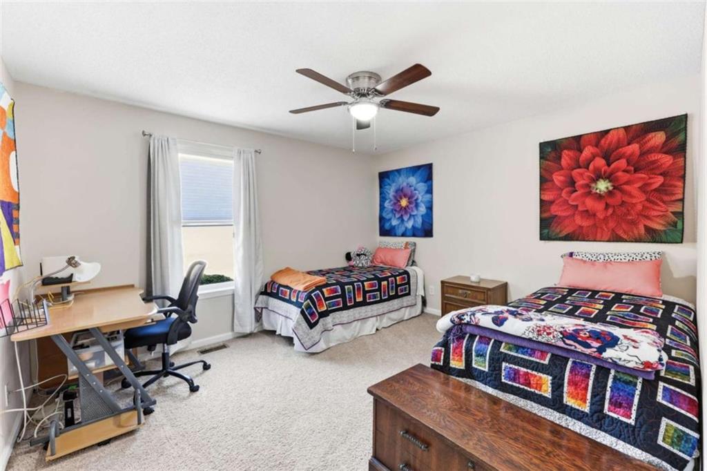 4033 Mt Vernon Road Gainesville, GA 30506 - Photo 20 of 47 a bedroom with furniture and a window