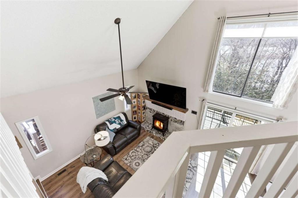 4033 Mt Vernon Road Gainesville, GA 30506 - Photo 23 of 47 a living room with furniture and a flat screen tv