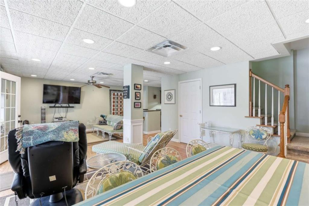 4033 Mt Vernon Road Gainesville, GA 30506 - Photo 29 of 47 a living room with furniture and a rug