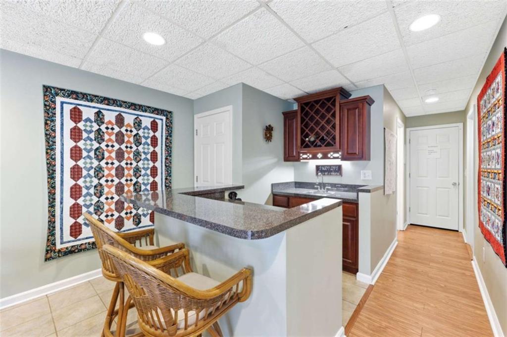 4033 Mt Vernon Road Gainesville, GA 30506 - Photo 32 of 47 a kitchen that has a sink and a stove in it