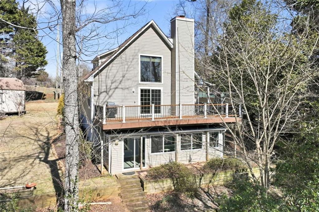 4033 Mt Vernon Road Gainesville, GA 30506 - Photo 40 of 47 a front view of a house with a tree