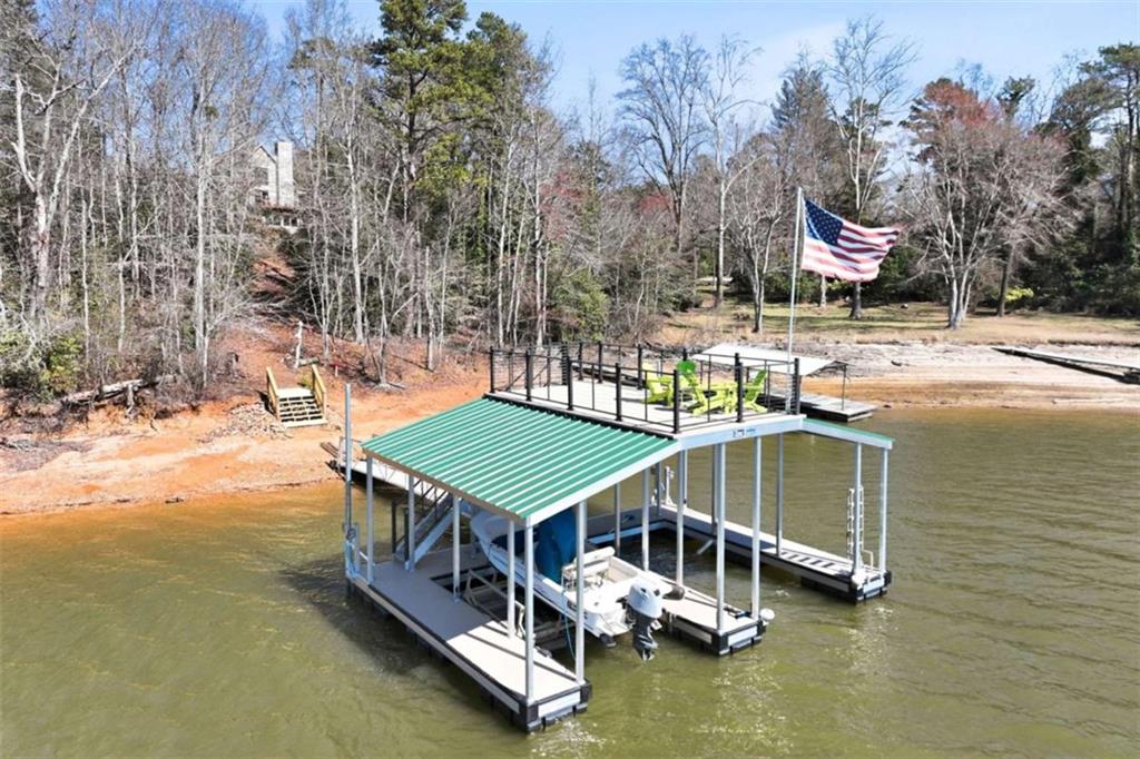 4033 Mt Vernon Road Gainesville, GA 30506 - Photo 45 of 47 a aerial view of a house with swimming pool and large trees
