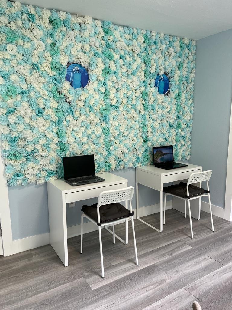 1535 Southwest 2nd Street Miami, FL 33135 - Photo 24 of 38 a dining room with furniture and wooden floor