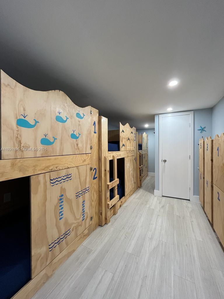 1535 Southwest 2nd Street Miami, FL 33135 - Photo 30 of 38 a view of a kitchen with refrigerator and white cabinets