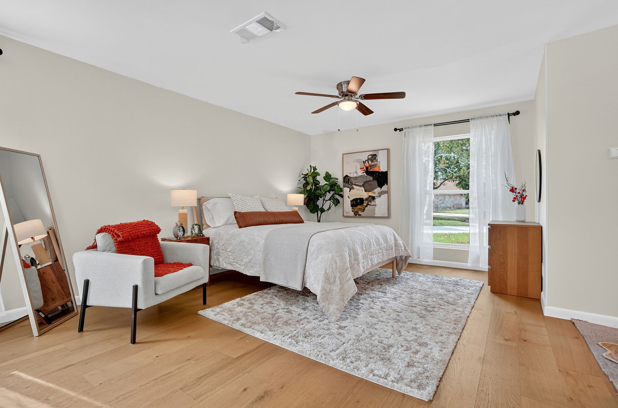 3202 Western Drive Austin, TX 78745 - Photo 14 of 34 a bedroom with a bed and a dresser