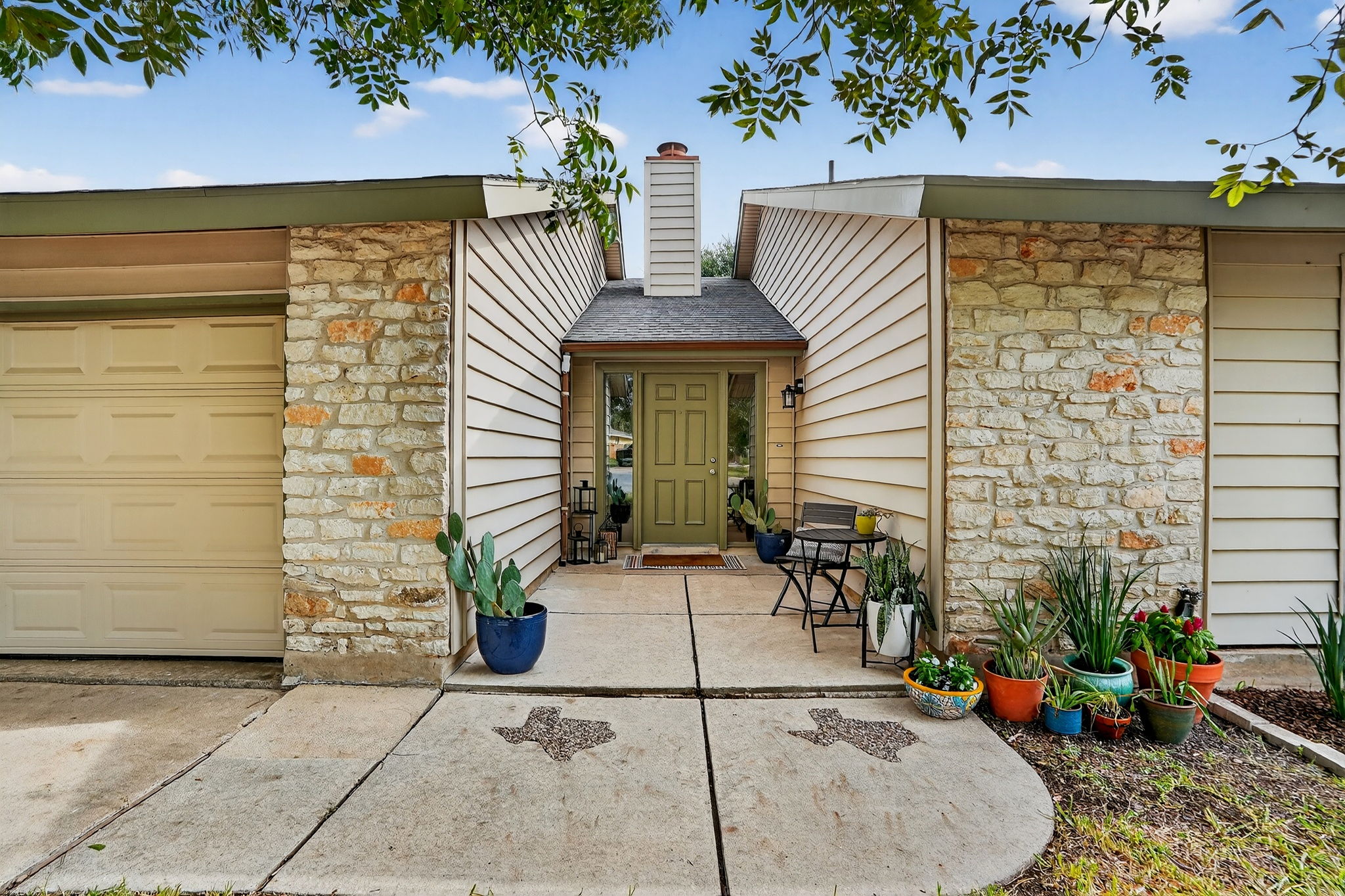 3202 Western Drive Austin, TX 78745 - Photo 2 of 34 a view of front door and potted plants
