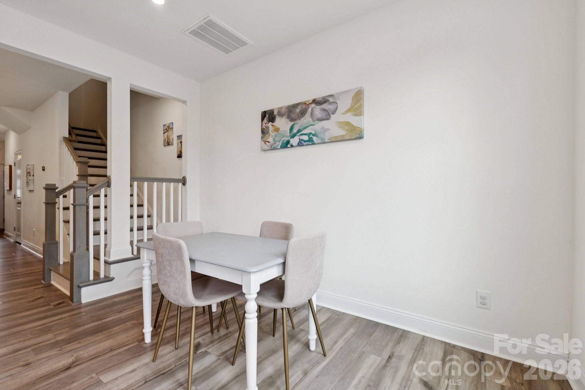 2081 Suttonview Road Fort Mill, SC 29708 - Photo 11 of 33 a view of a workspace with furniture and wooden floor