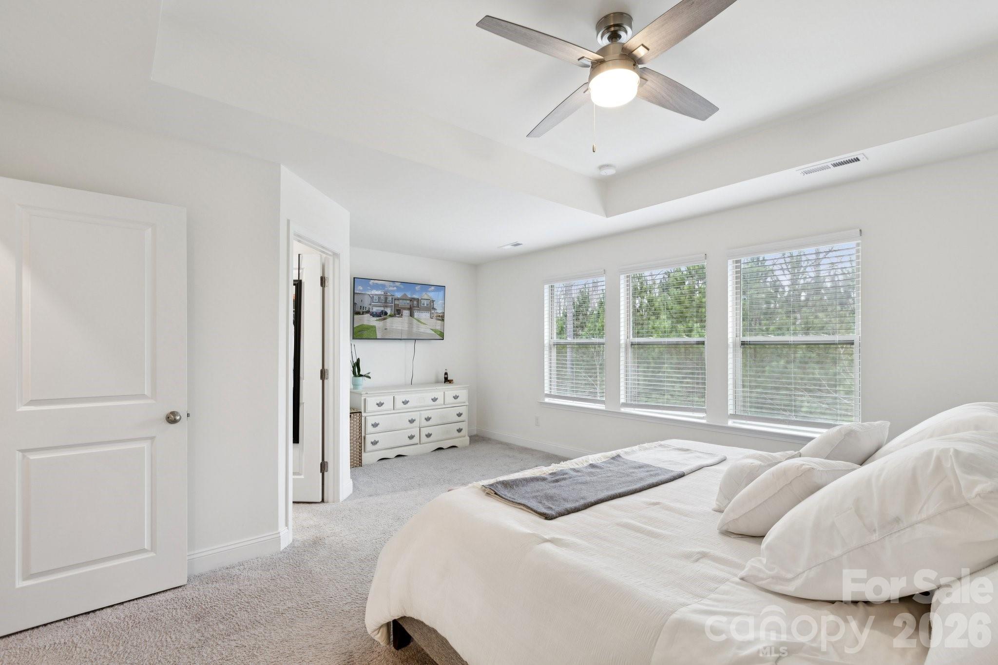 2081 Suttonview Road Fort Mill, SC 29708 - Photo 16 of 33 a bedroom with a bed and a large window