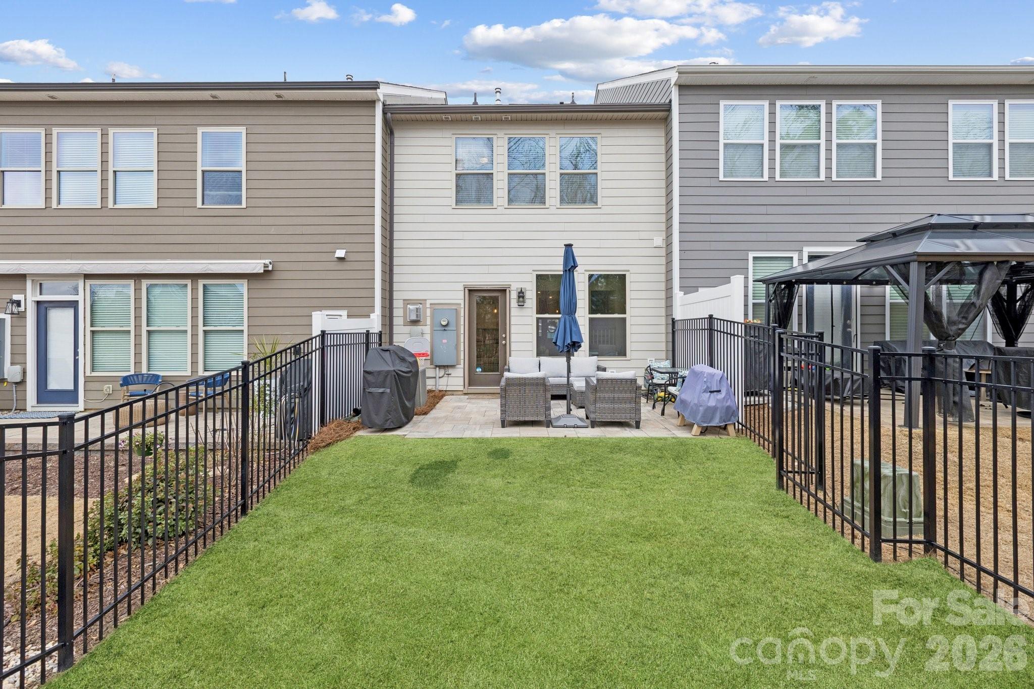 2081 Suttonview Road Fort Mill, SC 29708 - Photo 25 of 33 a view of a house with backyard and porch