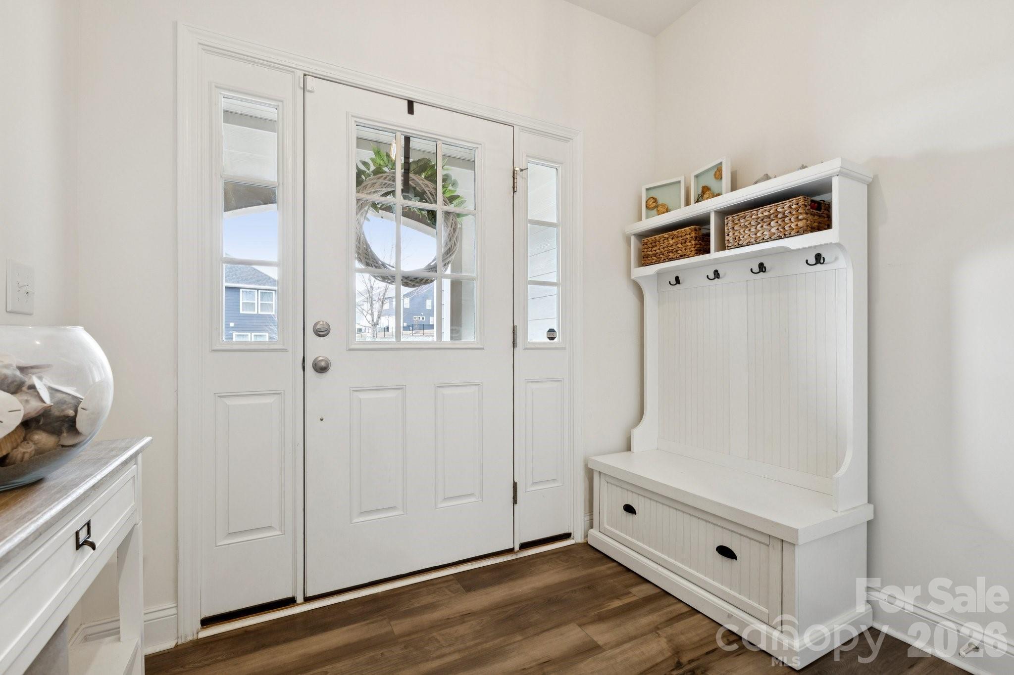 2081 Suttonview Road Fort Mill, SC 29708 - Photo 4 of 33 a room with white cabinets and wooden floor