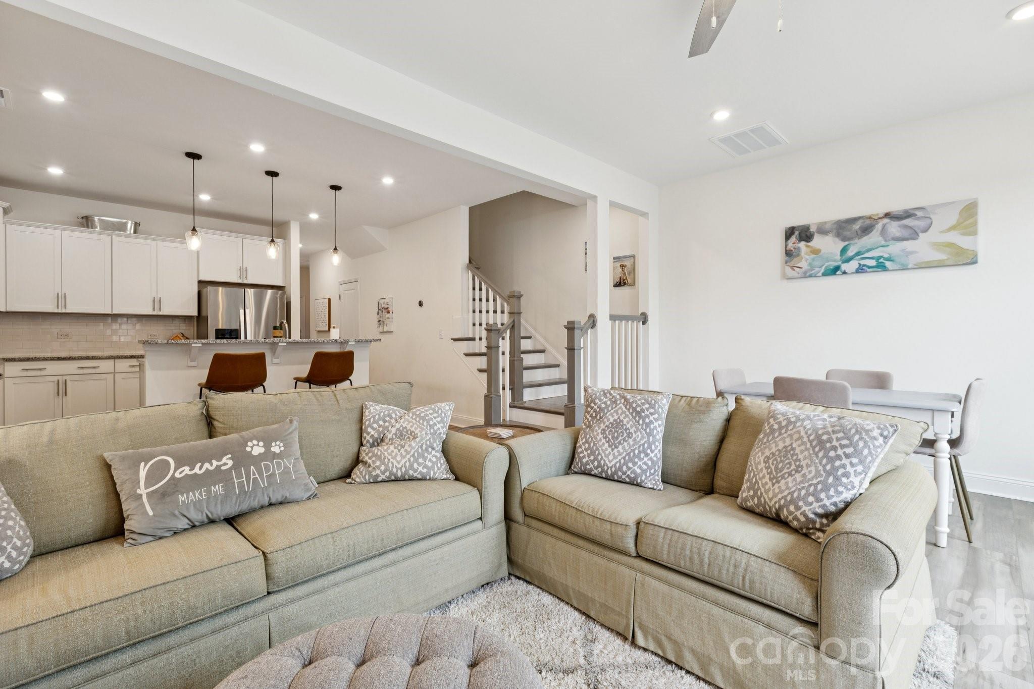2081 Suttonview Road Fort Mill, SC 29708 - Photo 10 of 33 a living room with furniture and kitchen view