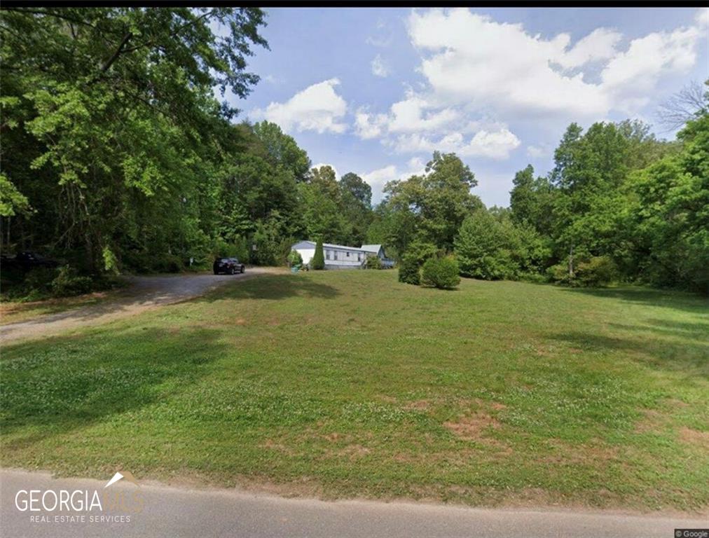 626 Lacy Road Canton, GA 30115 - Photo 1 of 1 a view of a lake view
