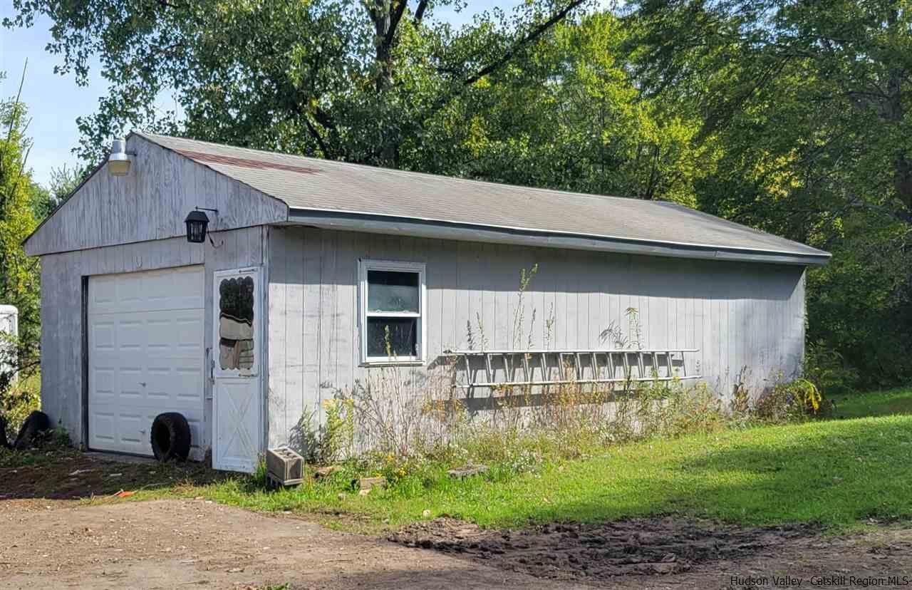 53 Coxing Road Cottekill, NY 12419 - Photo 3 of 13 a view of a small house with yard