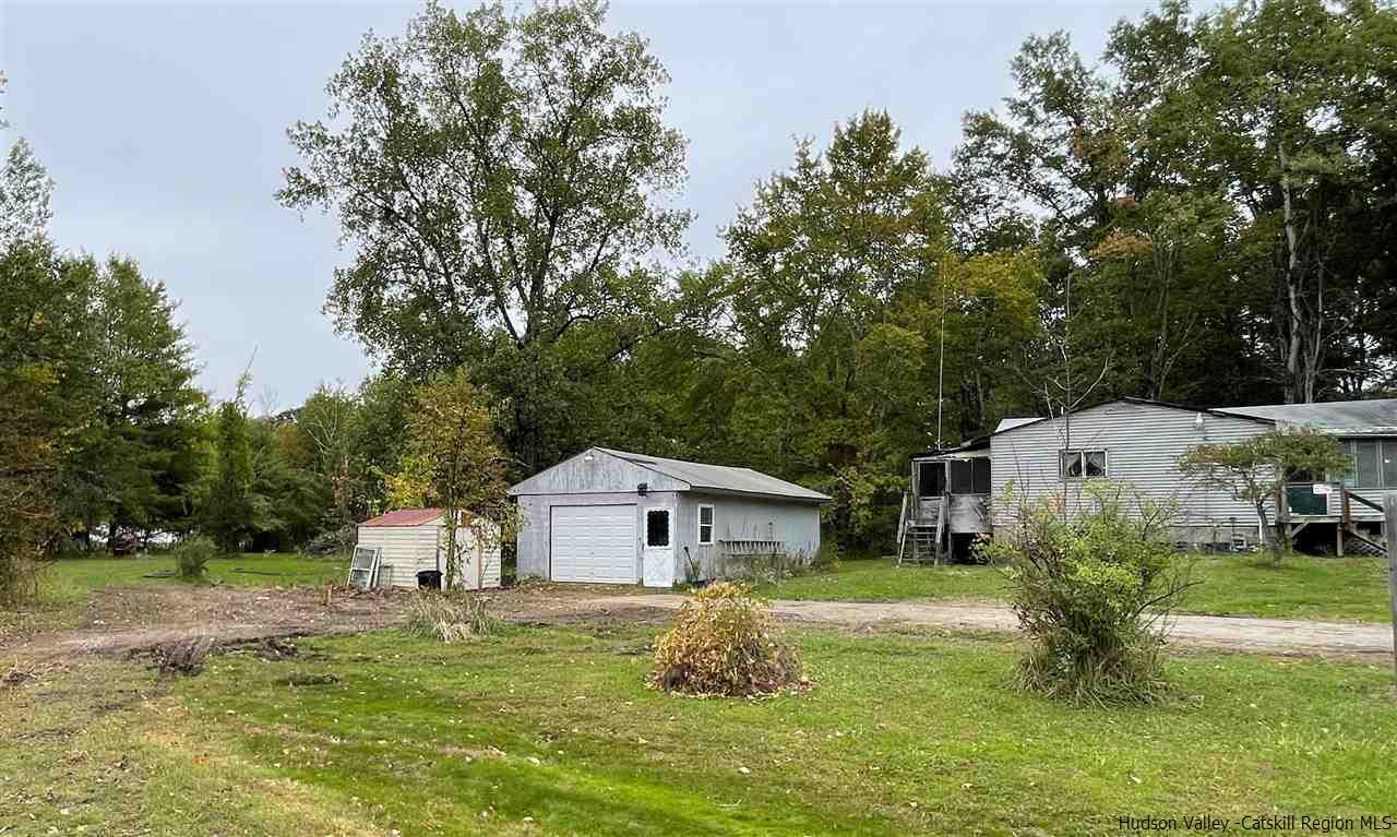 53 Coxing Road Cottekill, NY 12419 - Photo 8 of 13 a house view with a garden space