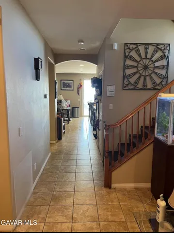 a view of gallery with wooden floor