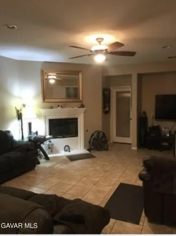 a bed room with a bed and a television