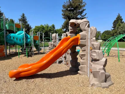 a view of a park with slide
