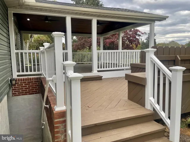 a view of balcony with furniture