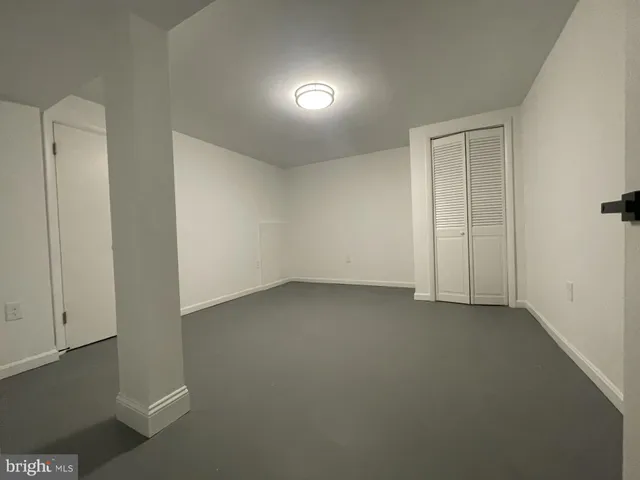 an empty room with closet