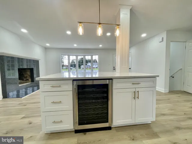 a kitchen with stainless steel appliances granite countertop a stove and a sink