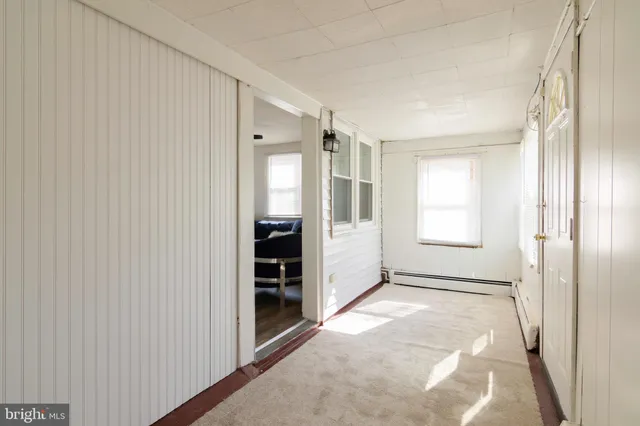 an empty room with windows