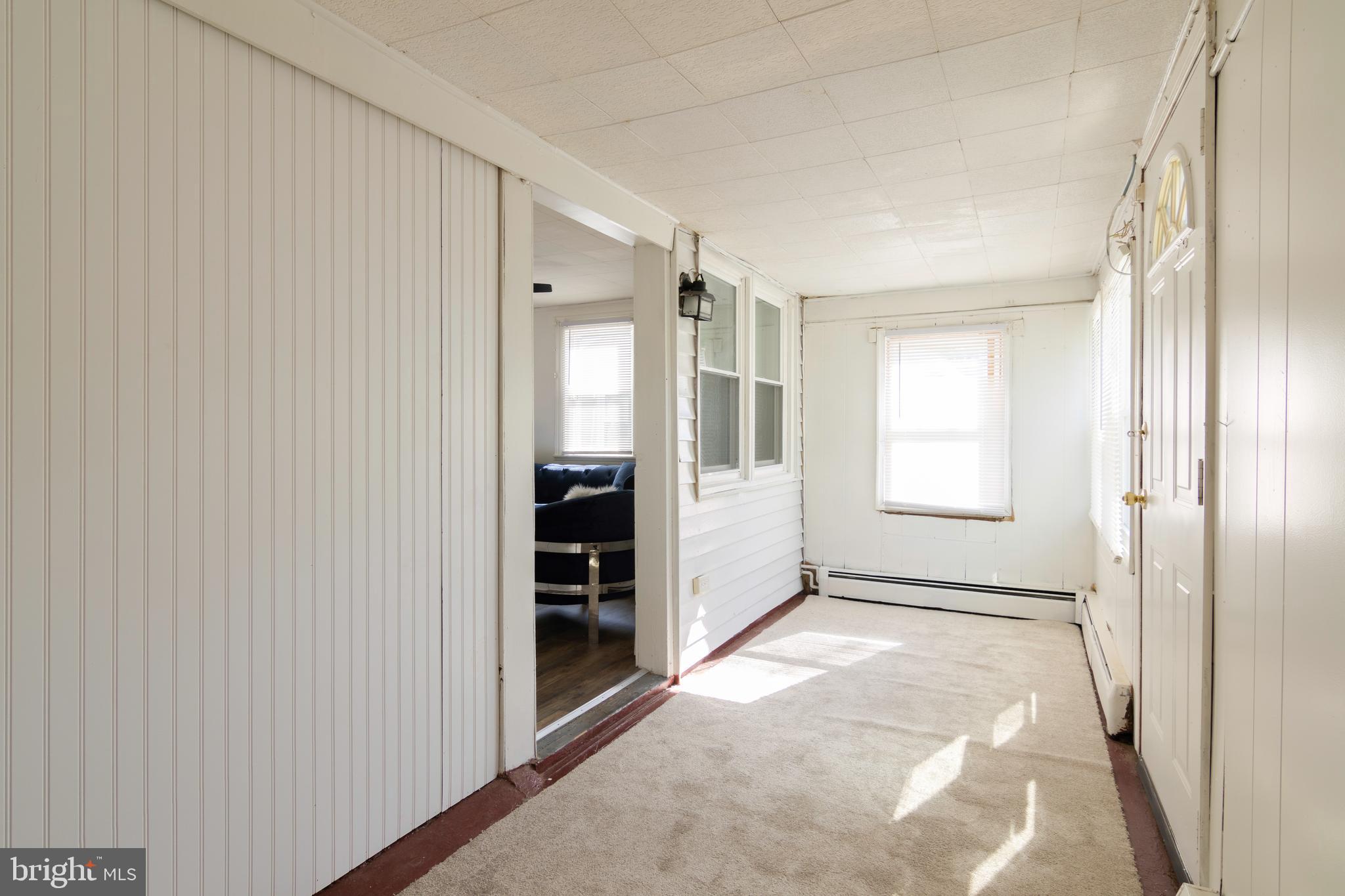 809 Truman Street Cambridge, MD 21613 - Photo 7 of 25 an empty room with windows